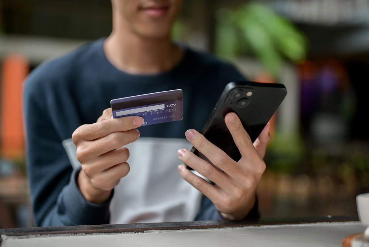 student paying online with credit card